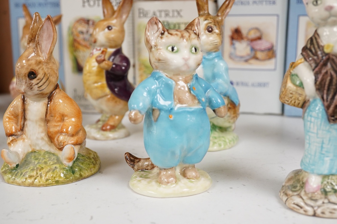 Nine Beswick Beatrix Potter figures, some stamped F. Warne & Co , largest 17cm high